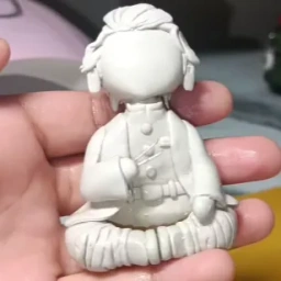 Sculpting clay by hand